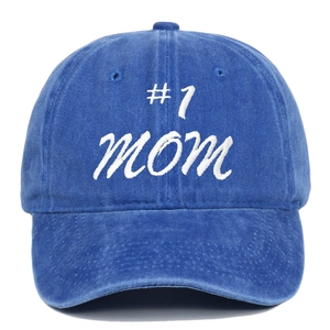Close-up of #1 mom 3D embroidery on vintage washed blue cotton baseball cap fabric