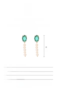 Detail of 5cm long drop earrings with green gemstone and natural freshwater pearls