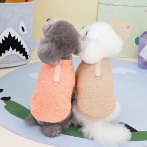 Detail of warm lamb fleece pet vest featuring dual metal D-rings for leash attachment