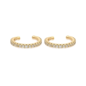 Paio di ear cuff dorati minimalisti con pietre di zircone scintillanti su sfondo bianco