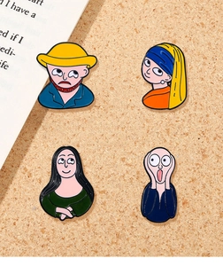 Detail of four artistic enamel pins featuring cartoon parodies of famous paintings on cork