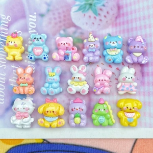 Detailed close-up of colorful resin animal charms including mini bears and rabbits