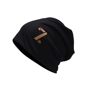Versatile black ribbed knit slouchy beanie hat featuring a brown 7th leather patch