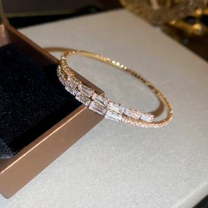 Golden titanium steel bangle with double-row baguette cubic zirconia inlay for women