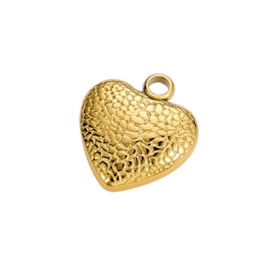 Detailed view of heart-shaped gold pendant with unique hammered texture and metal ring