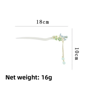 Detailed view of acetic acid flower hair stick with 10cm tassels and 18cm total length