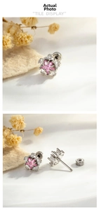 Detail of pink star zircon earring with secure screw back and polished steel finish