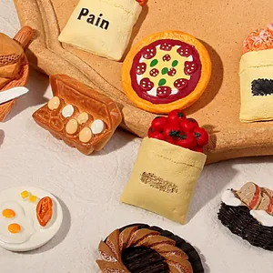 Hand-painted resin food magnets including pizza, eggs, and bread for fridge decor