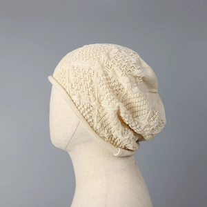 Japanese style hollow knit bucket hat in cream white featuring breathable woven patterns