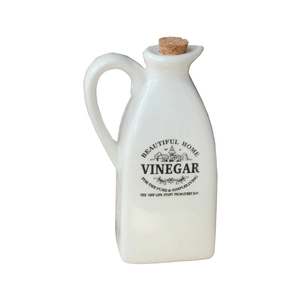 Minimalist white ceramic vinegar bottle with cork stopper and handle for kitchen storage