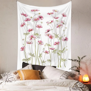 Detailed view of bohemian floral tapestry with pink cosmos flowers in a cozy bedroom decor