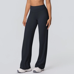 Close-up of high-waisted black wide-leg yoga pants with moisture-wicking fabric