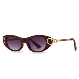 Modern burgundy oval sunglasses with punk metal hinges and sleek golden temples