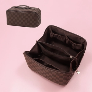 Macro detail of checkered PU leather cosmetic bag showing interior storage and zip closure