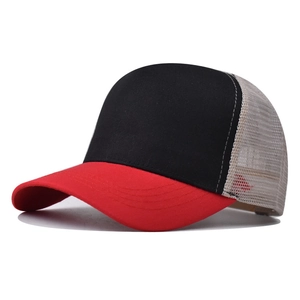 Classic cotton trucker hat with black front, red brim, and breathable mesh back