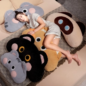Close-up of soft plush cat long body pillows used as comfortable bedside cushions