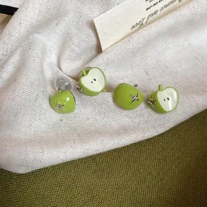 Green apple stud earrings with clear invisible clip-on backs for non-pierced ears