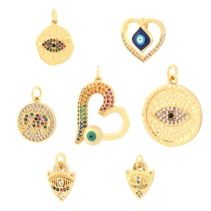 Golden Evil Eye charms set with colorful zircon stones and elephant heart pendants