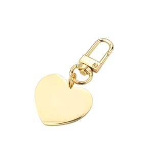Polished golden heart-shaped sublimation keychain with rotating spring clasp link