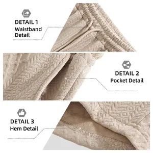 Men's casual loose beige shorts featuring textured jacquard fabric and drawstring waist