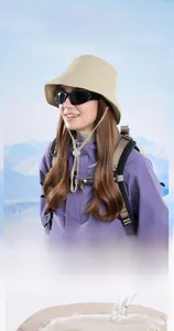 Close-up of khaki quilted winter bucket hat with adjustable windproof drawstring detail