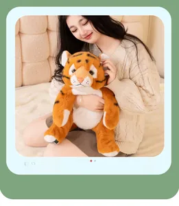Detail of a soft plush tiger toy with realistic stripes held in a cozy home setting