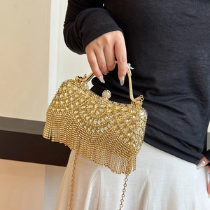 Elegant gold rhinestone evening clutch bag with crystal fan pattern and chain fringe