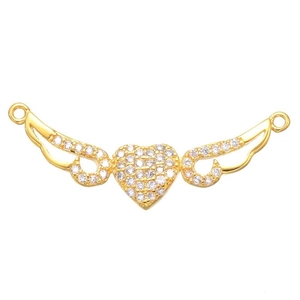 Close-up of a gold winged heart connector inlaid with sparkling zircon for jewelry making