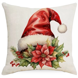 Detail of Christmas pillow cover with watercolor Santa hat and poinsettia floral print