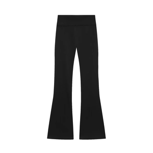 Detailed view of black high-waisted flared trousers with wide ribbed waistband
