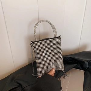 Sparkling silver rhinestone mini handbag with circular handle and chain for evening wear