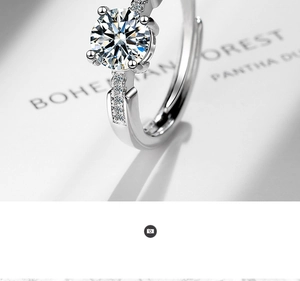 Close-up of adjustable sparkling zircon ring with classic four-prong setting