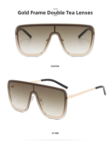 Close-up of gold metal frame oversized sunglasses with brown gradient lenses