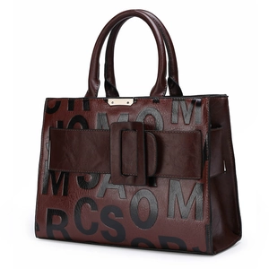 Deep brown retro tote bag with letter print and polished leather texture for women