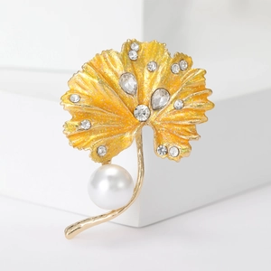 Ginkgo leaf brooch with yellow enamel, crystal rhinestones and a large round pearl