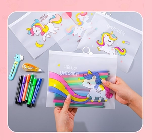 Close-up of translucent frosted unicorn file bag holding colorful watercolor pens