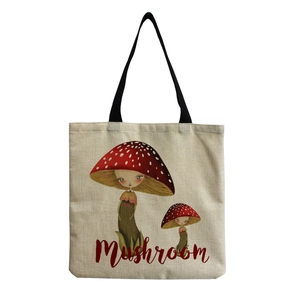 Detail of cute cartoon mushroom print and red text on beige linen tote bag fabric