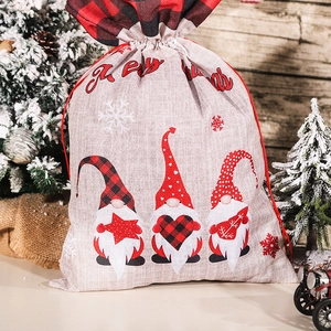 Linen Christmas drawstring gift bag with three gnomes and festive holiday decor