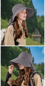 Detail view of a grey wide-brim sun hat with neck flap and adjustable chin strap in outdoor setting
