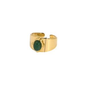 Gold wide band stainless steel ring featuring an oval green natural stone on white background