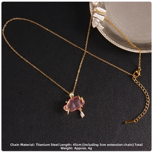 Macro detail of cloud necklace with golden lightning and teardrop on leather background