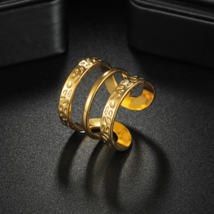 Minimalist 18K gold plated stainless steel spiral ring with a hammered texture finish