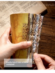 Detailed view of hollowed-out lace notepad with vintage laser-cut edges for journaling