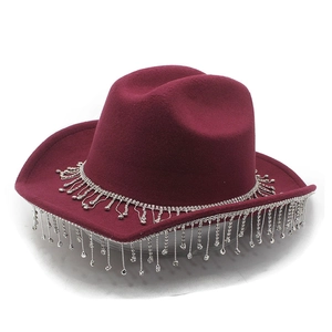 Burgundy cowboy hat featuring silver rhinestone tassel chains and felt texture