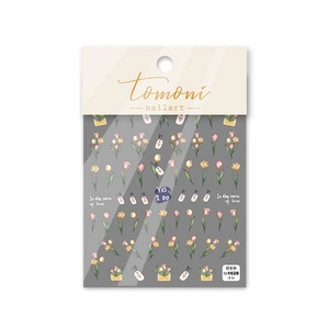 Detailed sheet of tulip nail art stickers with In the name of love text and floral patterns