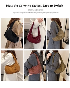 Chic suede crescent shoulder bag with silver studs and heart detail in six fall colors