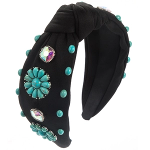 Detail of bohemian knotted headband with turquoise beads and rainbow crystals