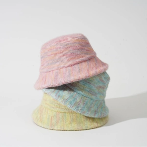 Colorful striped fuzzy knit bucket hats for women in pink blue and yellow for autumn