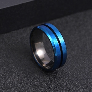 Brushed blue stainless steel spinner ring with black grooved center and offset edges