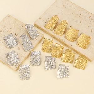 Irregular hammered square metal stud earrings in gold and silver finish set